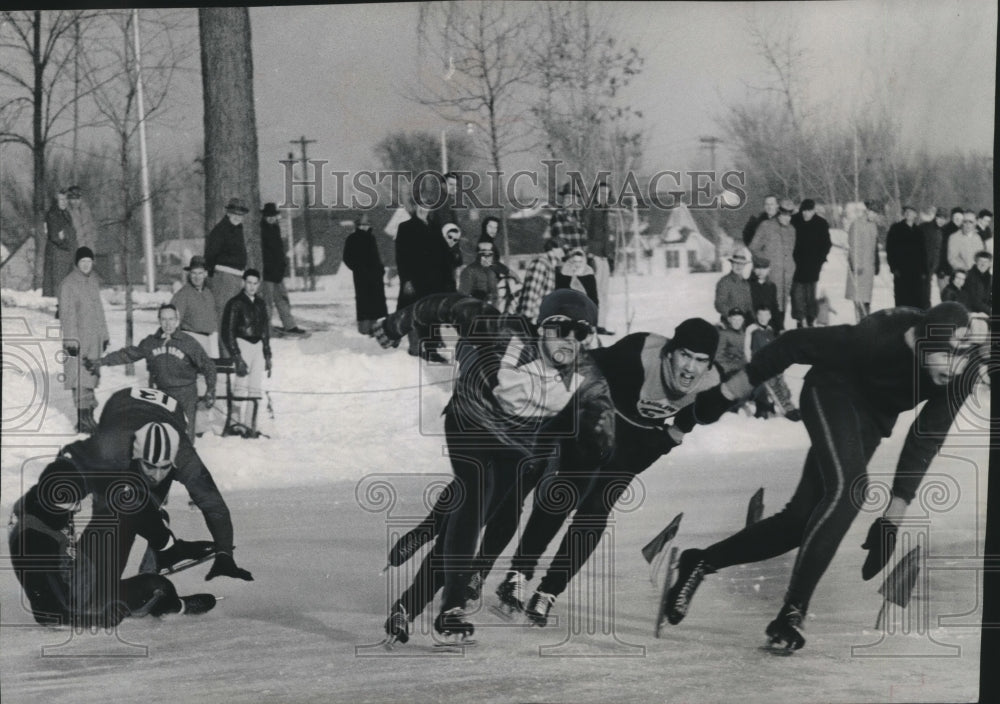 1957 Press Photo Two skaters down in men&#39;s three-quarter mile skating,West Allis- Historic Images