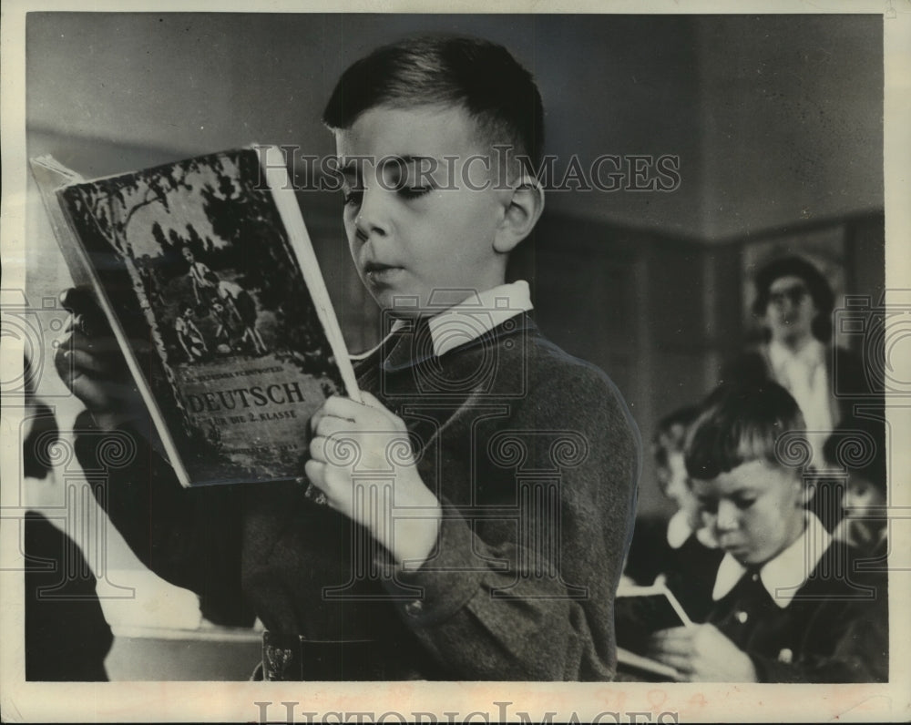 1959 Press Photo A third grader in Moscow, Misha is already reading German.- Historic Images