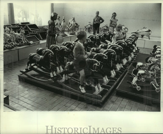 1961 Press Photo Youngsters rock on wooden horses at Children's World in Moscow- Historic Images
