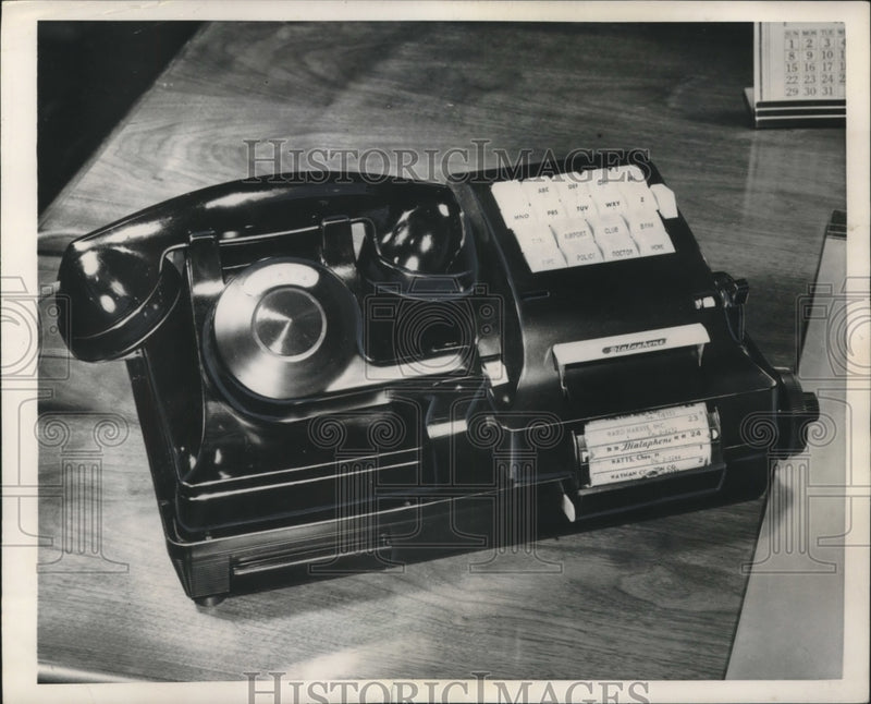Load image into Gallery viewer, 1951 Press Photo An automatic number calling device fitted to a standard phone
