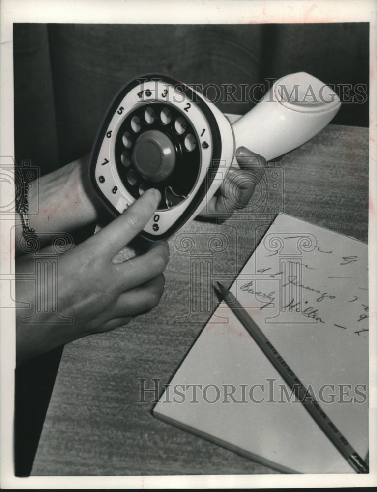 1956 Press Photo A unique telephone with dial underneath the device - mjc04390- Historic Images