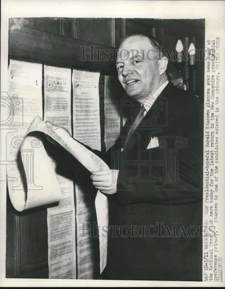 1952 Press Photo Harold Stassen, Presidential hopeful reads news copy Washington- Historic Images