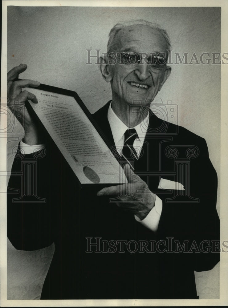 1965 Press Photo Leo Tiefenthaler of Milwaukee with his citation - mjc12817- Historic Images