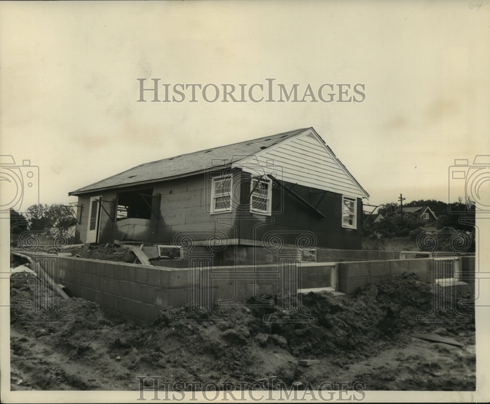 1951 Press Photo Freakish winds lift unfinished home off foundation, Madison- Historic Images