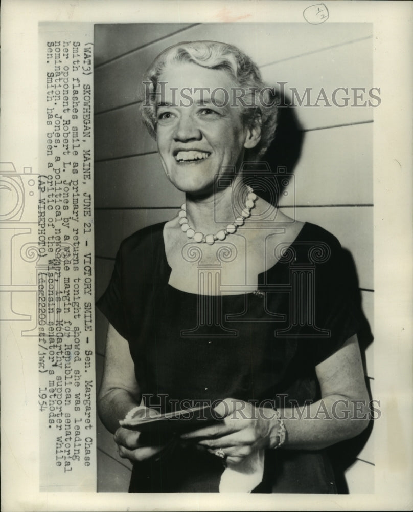 1954 Press Photo Senator Margaret Chase Smith smiling at primary returns, Maine.