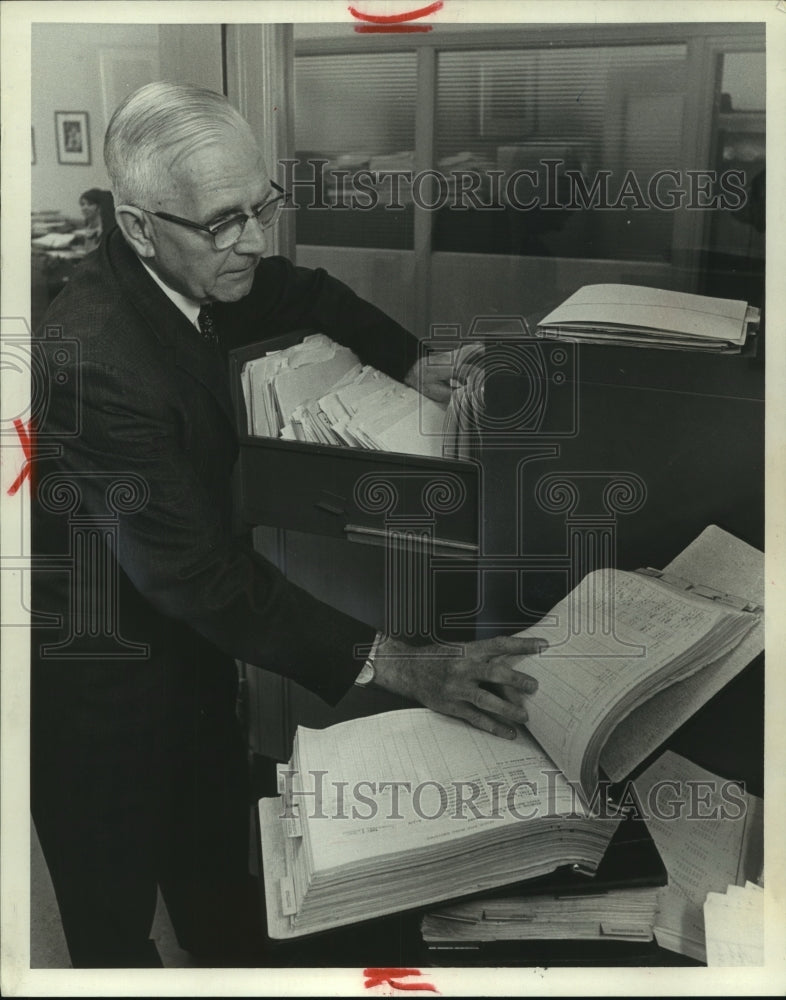 Load image into Gallery viewer, 1968 Press Photo Adolph Thomas at Catholic Family Life Insurance, Milwaukee
