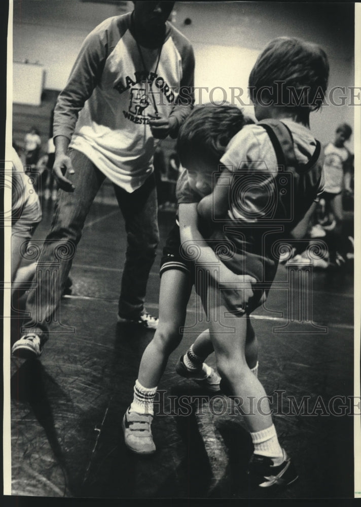 1986 Press Photo Christopher Moves In On Jason Aulenbacher At Tournament- Historic Images