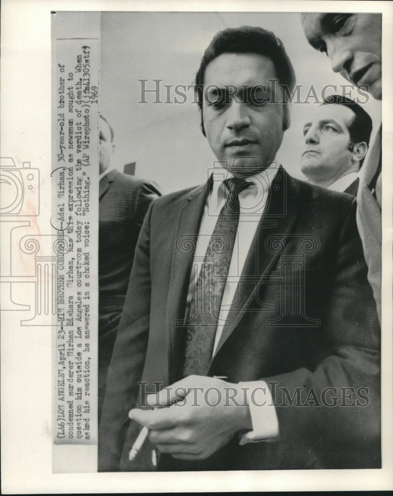Load image into Gallery viewer, 1969 Press Photo Adel Sirhan outside a Los Angeles courtroom today after verdict
