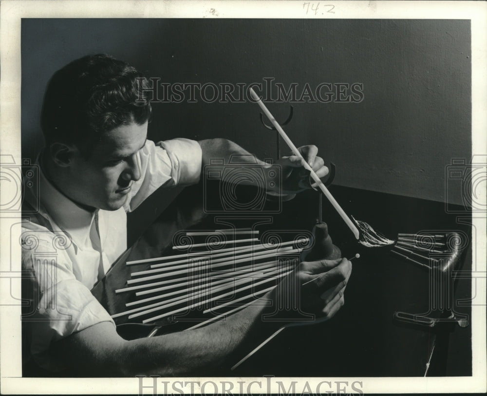 1942 Press Photo Glass Rods with Opaque Pigments Used to Make Simulated Pearls- Historic Images