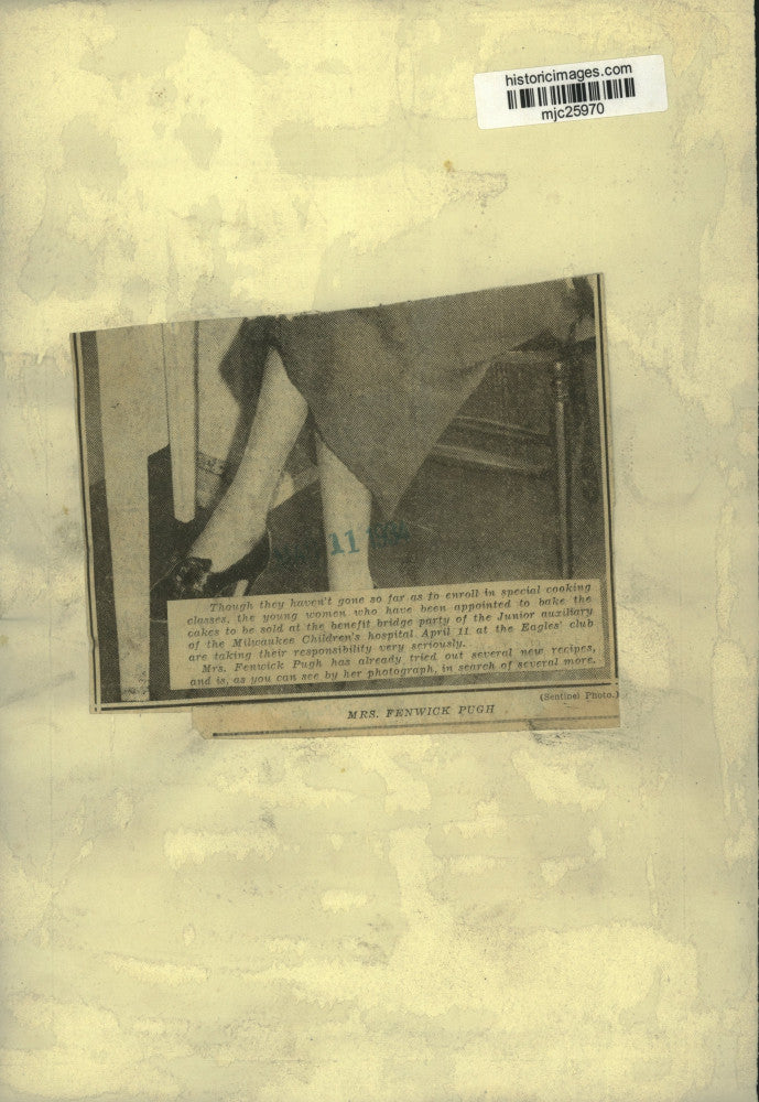 Load image into Gallery viewer, 1934 Press Photo Mrs. Fenwick Pugh takes seriously her assignment to bake a cake

