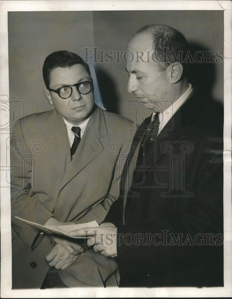 Load image into Gallery viewer, 1957 Press Photo Robert Schlesinger &amp; his attorney Harris Steinberg, New York
