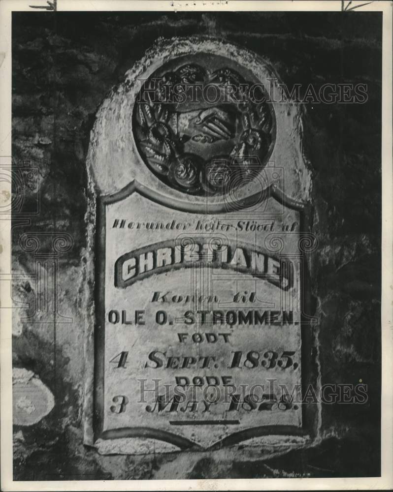 1941 Press Photo Tombstone in Sanitary Plumbing shop basement wall, Wisconsin