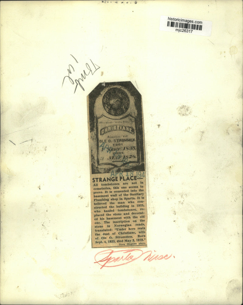 1941 Press Photo Tombstone in Sanitary Plumbing shop basement wall, Wisconsin