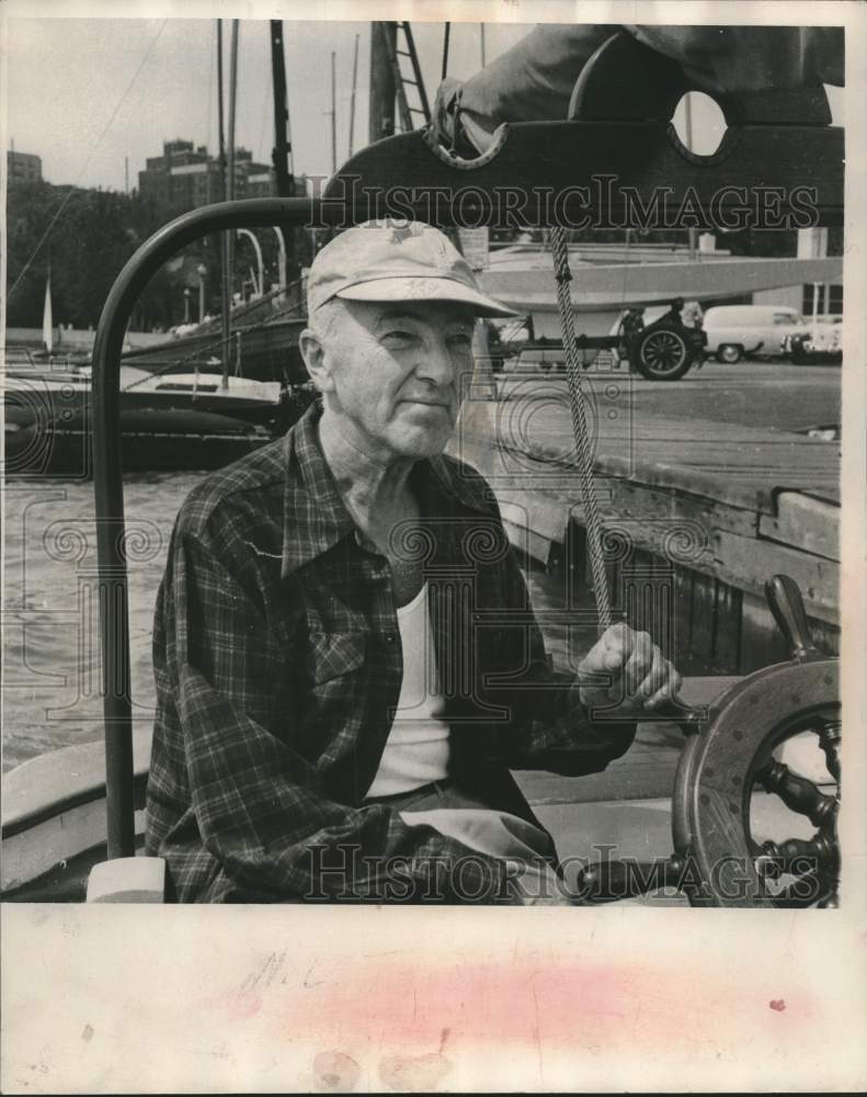Load image into Gallery viewer, 1954 Press Photo North Channel - N.L. (Telly) Telander at the helm of Gypsy
