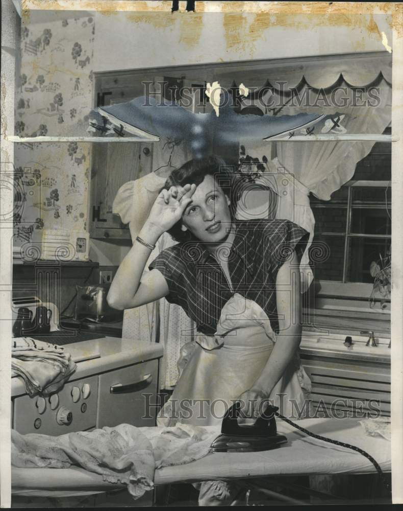 1950 Press Photo Mrs. Rex Rockhill ironing clothes, Milwaukee - mjc26821