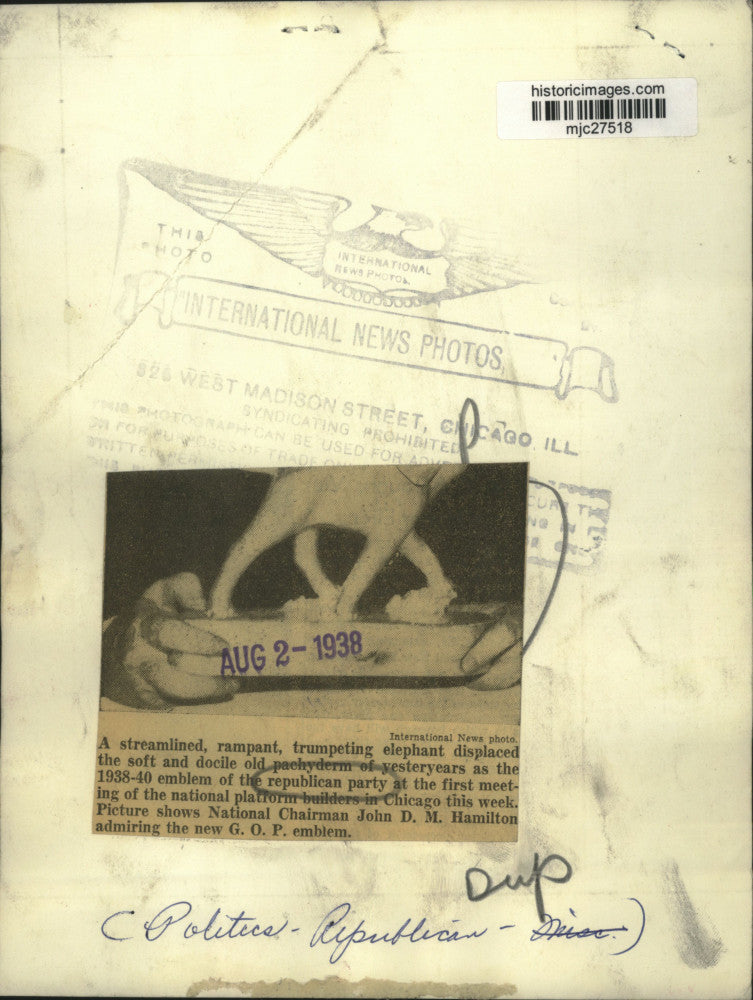 1938 Press Photo John D. M. Hamilton admires republican elephant in Chicago