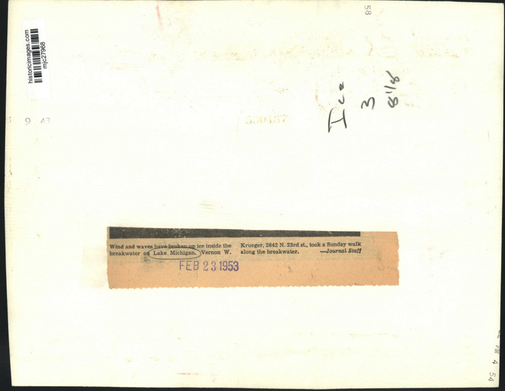 1953 Press Photo Vernon W. Krueger along breakwater on Lake Michigan, Wisconsin