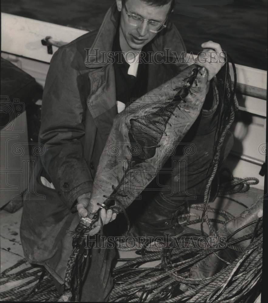 1953 Press Photo Robert P. Meyer holding a geophone on Lake Michigan, Milwaukee- Historic Images