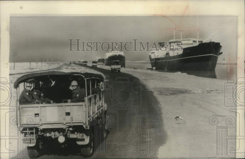 1956 Press Photo Trucks and ships at Suez Canal - mjc29162
