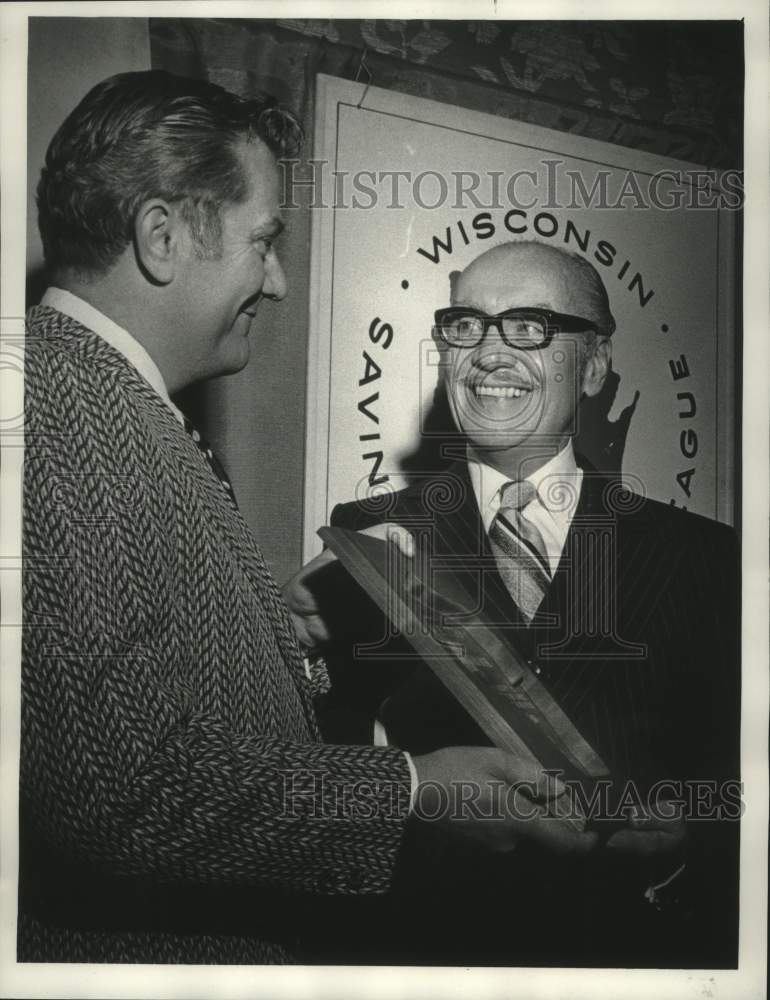 Load image into Gallery viewer, 1974 Press Photo Retiring banker John Stipp receives plaque from Walter Klunk,
