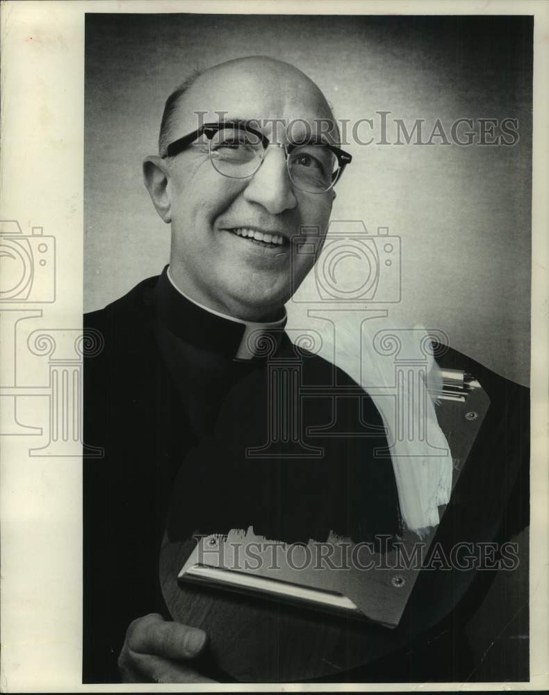 1965 Press Photo Monsignor Joseph P. Springbob, Catholic Social Services- Historic Images