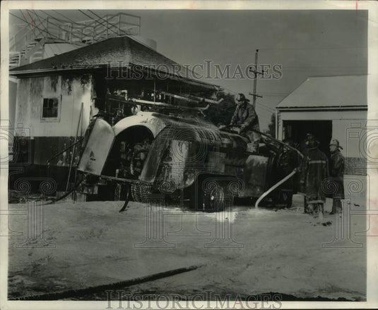 1959 Press Photo Firefighters use foam on fire at Midland Cooperative plant- Historic Images