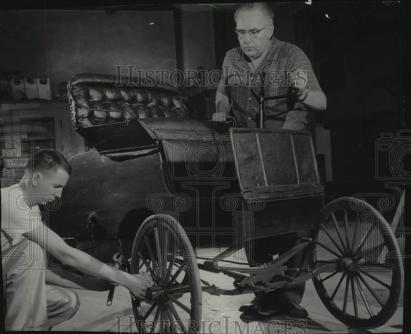 Load image into Gallery viewer, 1958 Press Photo Robert Lietz and Thomas Hanson work on car at Milwaukee Museum
