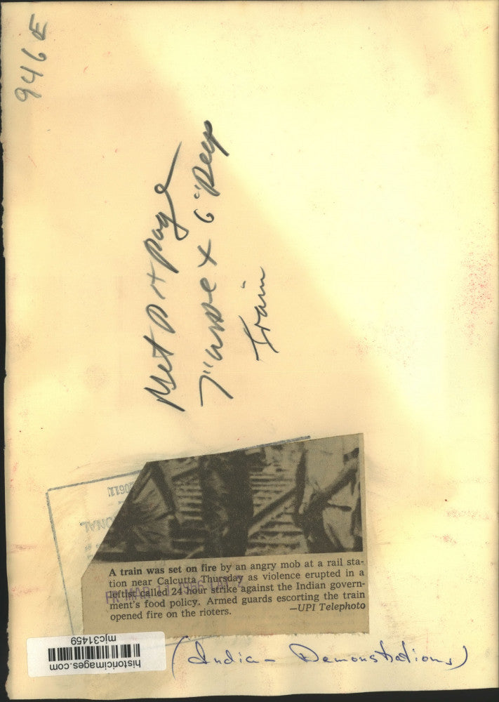 1966 Press Photo Demonstrators set train on fire near Calcutta, India