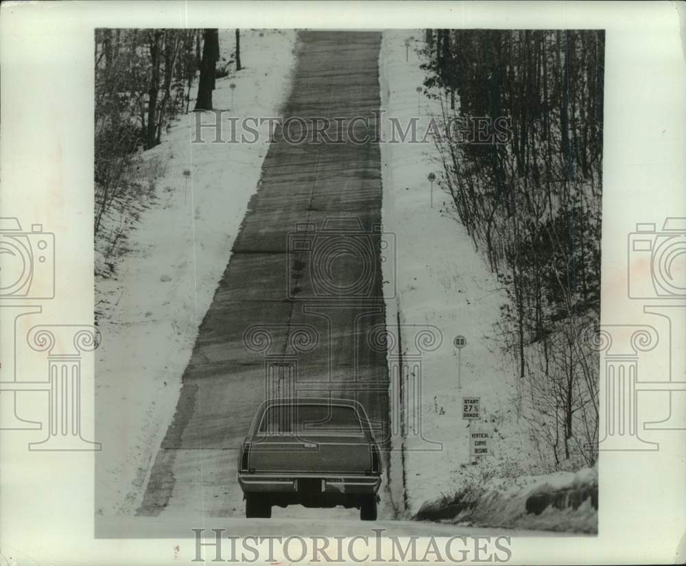 1964 Press Photo car on 27% grade incline at General Motors test site, Michigan
