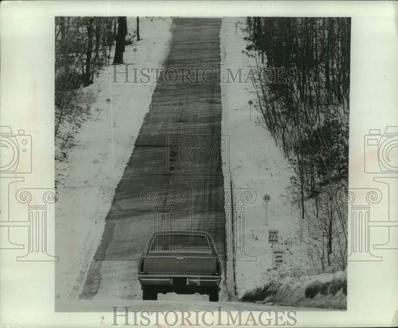 Load image into Gallery viewer, 1964 Press Photo car on 27% grade incline at General Motors test site, Michigan
