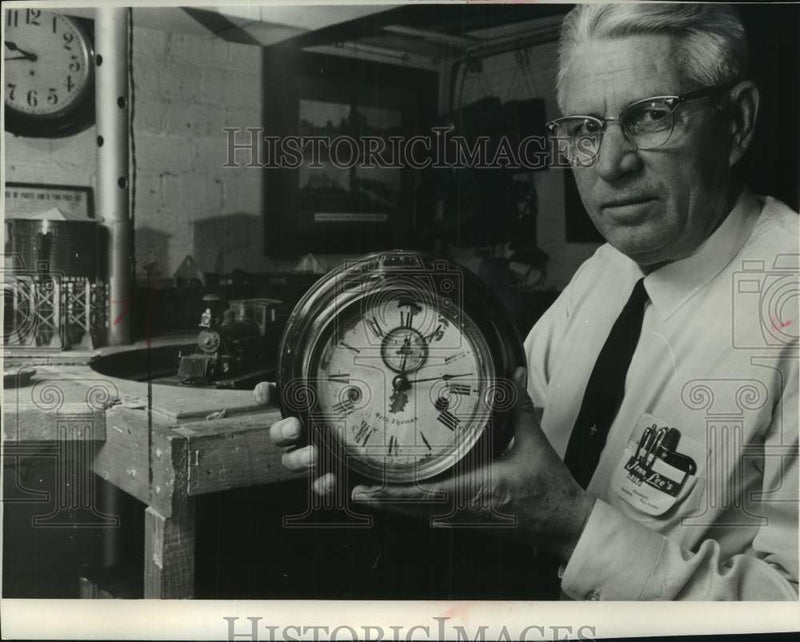 Load image into Gallery viewer, 1966 Press Photo Railroad Collector Wesley Foshay with clock in Wisconsin
