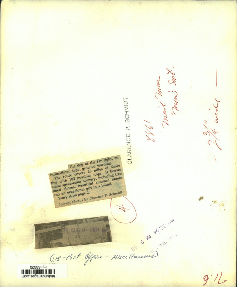 1964 Press Photo Post Office route walks past an anti-mailman dog who growls.