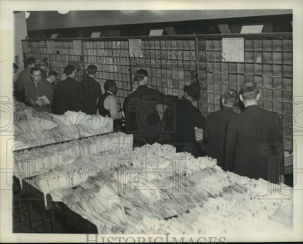 1959 Press Photo Post office clerks hand sorting mail in sorting room.