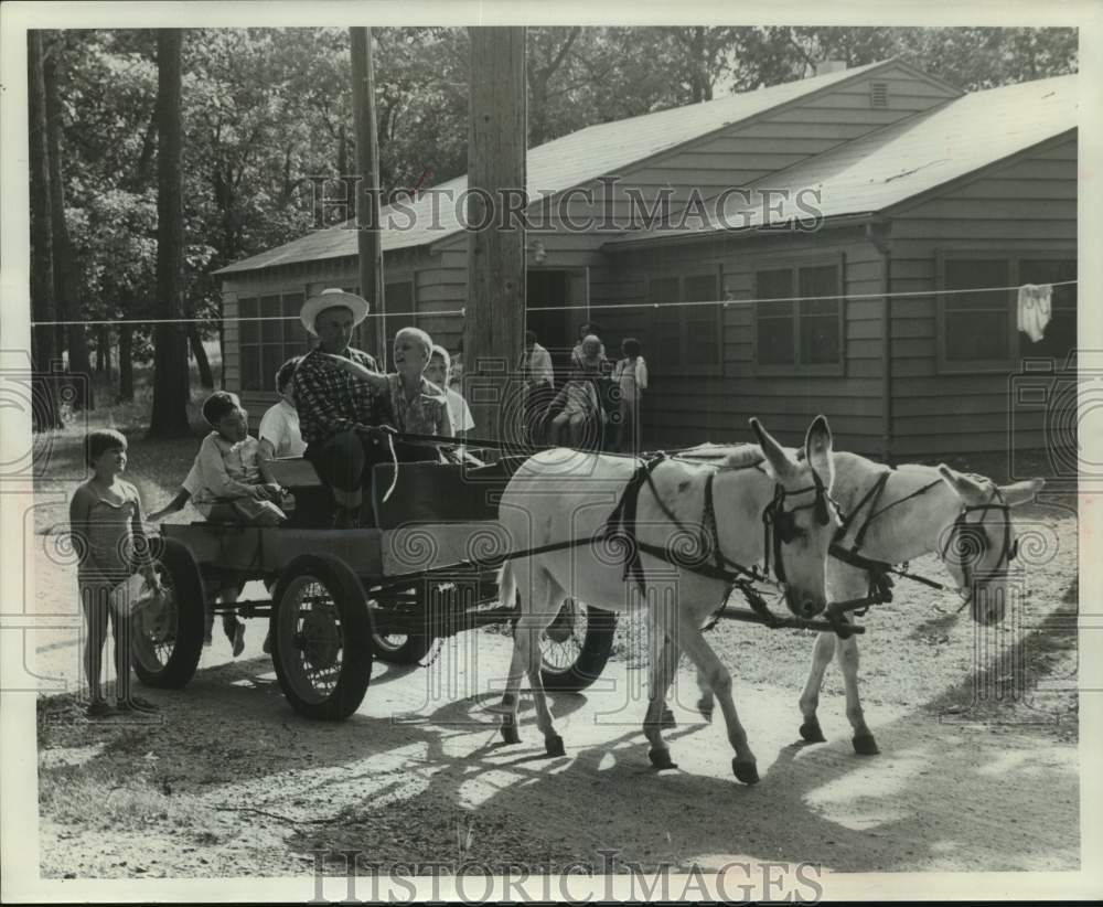 1958 Press Photo Donkeys provided rides at Timber Trail Camp near Oconomowoc.- Historic Images