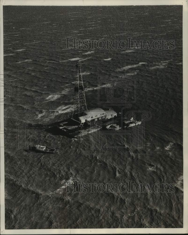 Load image into Gallery viewer, 1954 Press Photo Oil rig mounted on barge in Gulf of Mexico off Louisiana Coast
