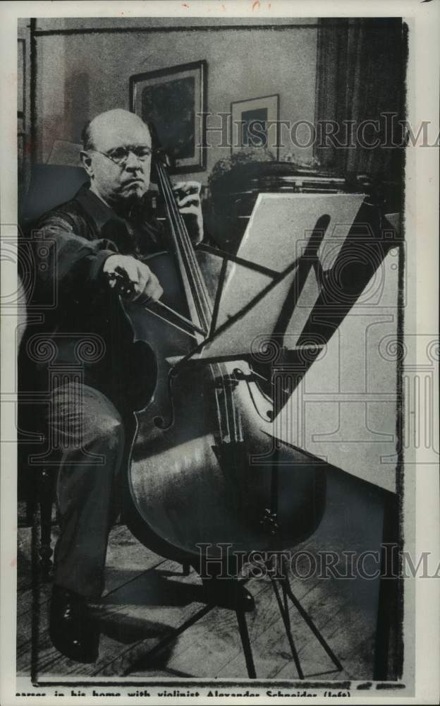 1958 Press Photo Man plays a song on the cello - mjc35104- Historic Images