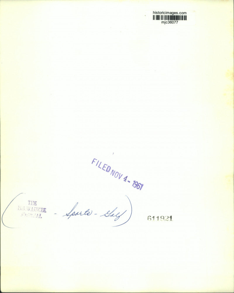 1961 Press Photo Golfer Prepares to Tee Off on Ball - mjc36077