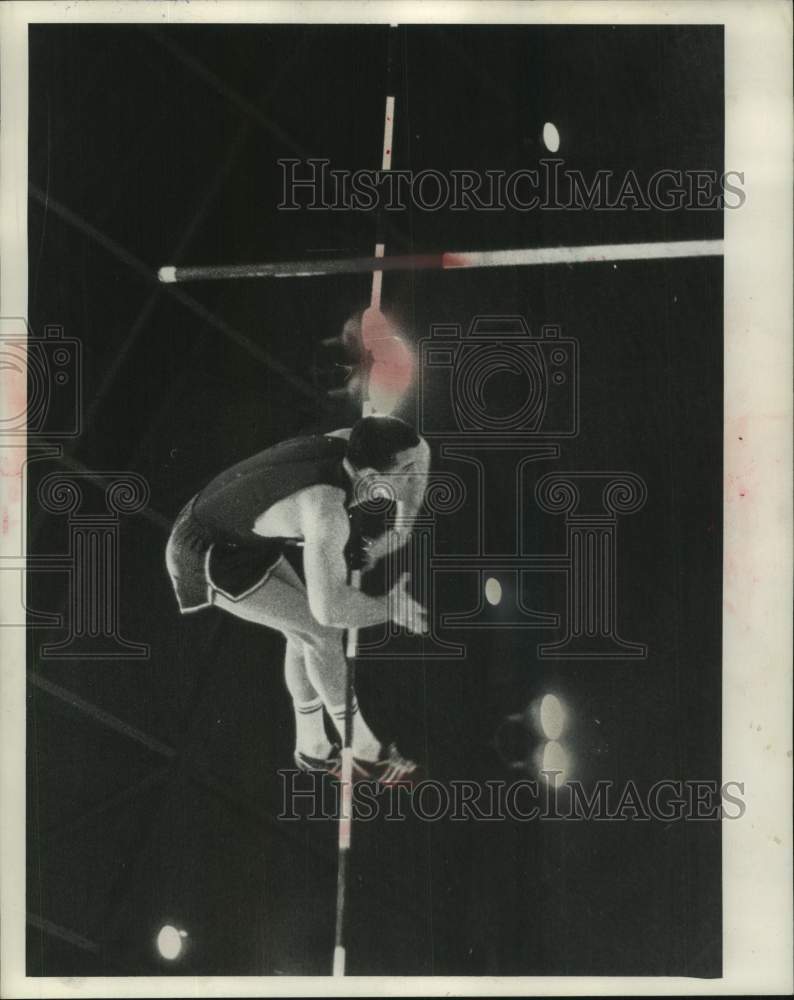 Load image into Gallery viewer, 1959 Press Photo Pole Vaulting at the Milwaukee Journal Track Meet - mjc36445
