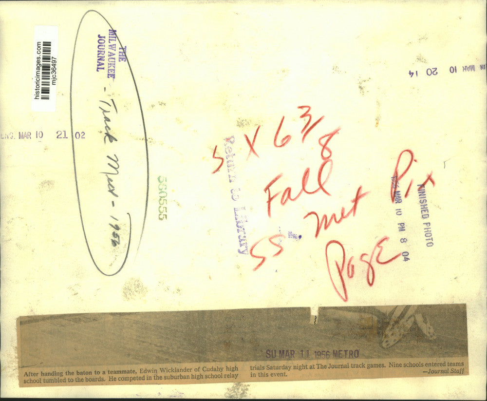 1956 Press Photo Cudahy Runner Edwin Wicklander Falls After Handing Off Baton