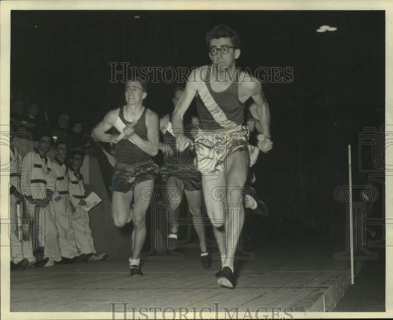 Load image into Gallery viewer, 1955 Press Photo Whitefish Bay Runner Leads In The Milwaukee Journal Track Meet

