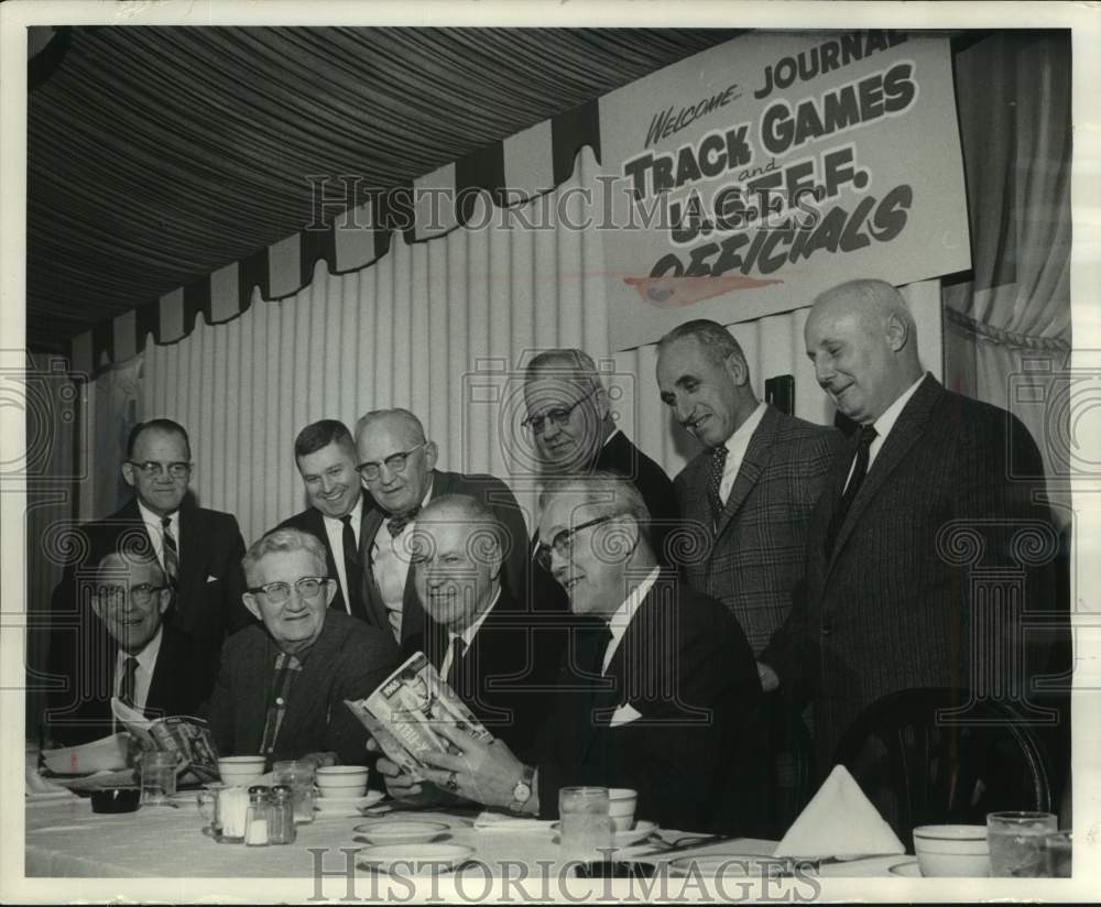 1965 Press Photo officials of the Journal indoor games meet to discuss rules, WI- Historic Images