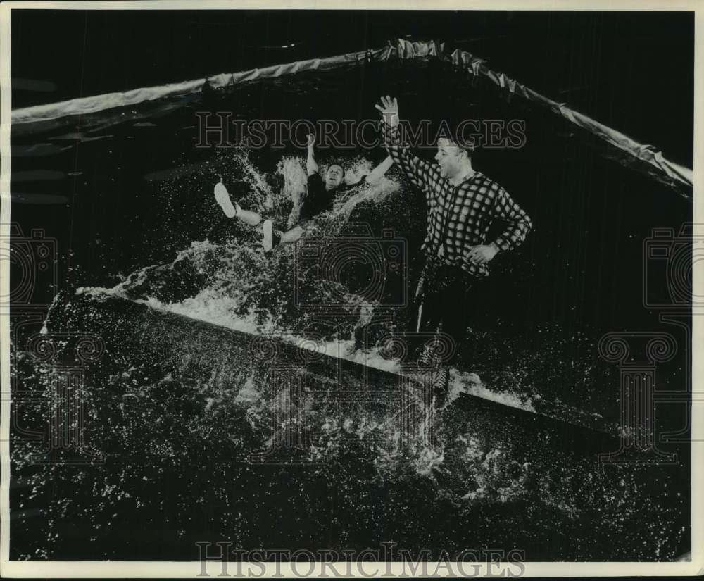 1964 Press Photo Log rolling action at The Sentinel Sports and Boat Show