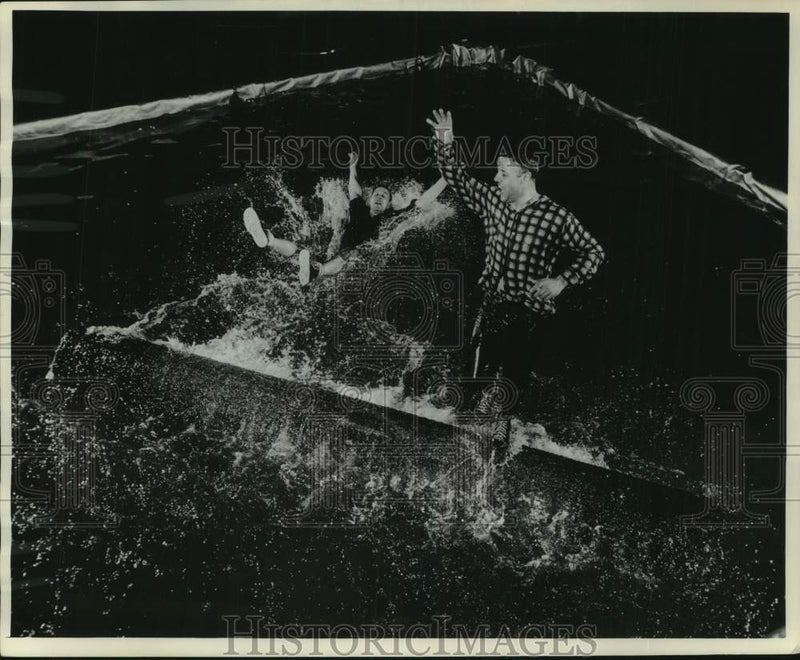Load image into Gallery viewer, 1964 Press Photo Log rolling action at The Sentinel Sports and Boat Show
