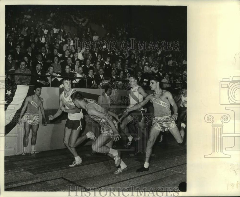 Load image into Gallery viewer, 1964 Press Photo Baton passing at the Milwaukee Journal track meets - mjc37193
