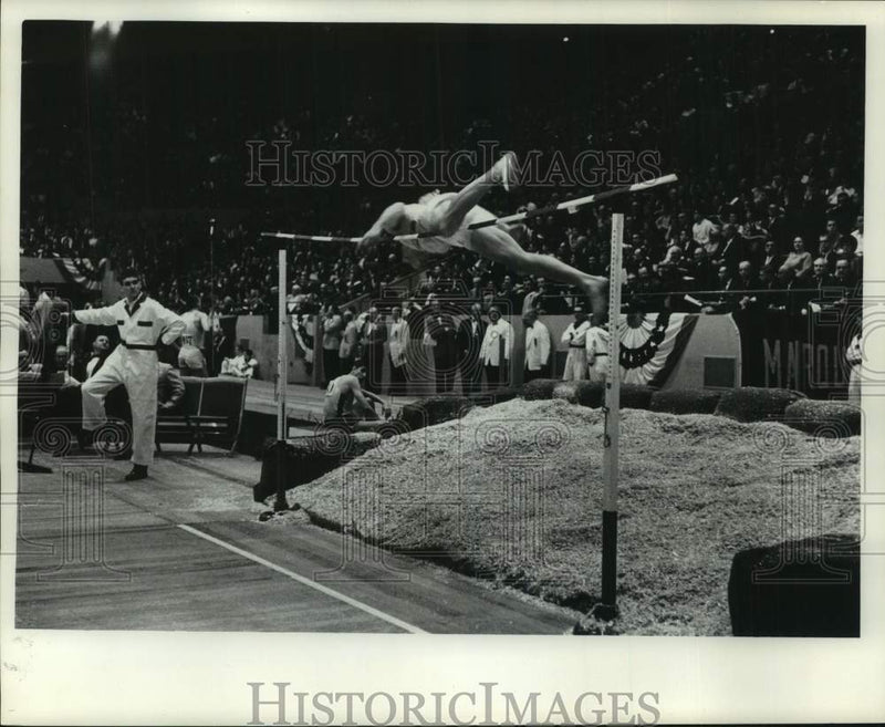 Load image into Gallery viewer, 1966 Press Photo Pole vaulting at Milwaukee Journal track meets - mjc37196
