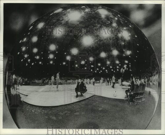 1969 Press Photo Journal photographer Heinz Kluetmeier shoots into globe, Arena- Historic Images
