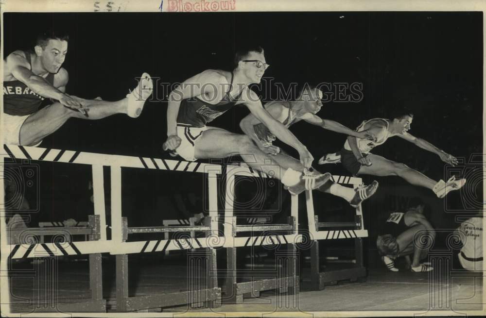 1965 Press Photo Runners leap hurdles in Milwaukee Journal Track Meet