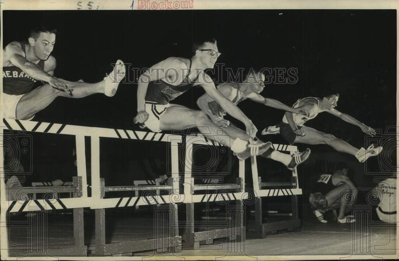 Load image into Gallery viewer, 1965 Press Photo Runners leap hurdles in Milwaukee Journal Track Meet
