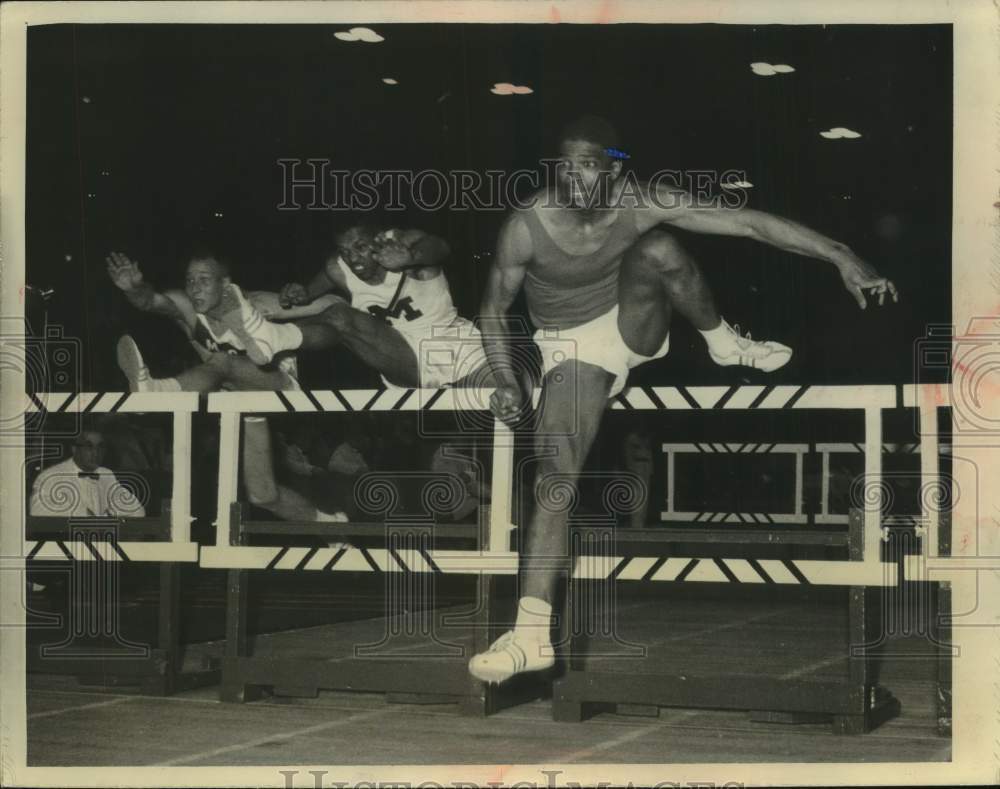 1961 Press Photo Hayes Jones and others leap last hurdle during Milwaukee meet- Historic Images