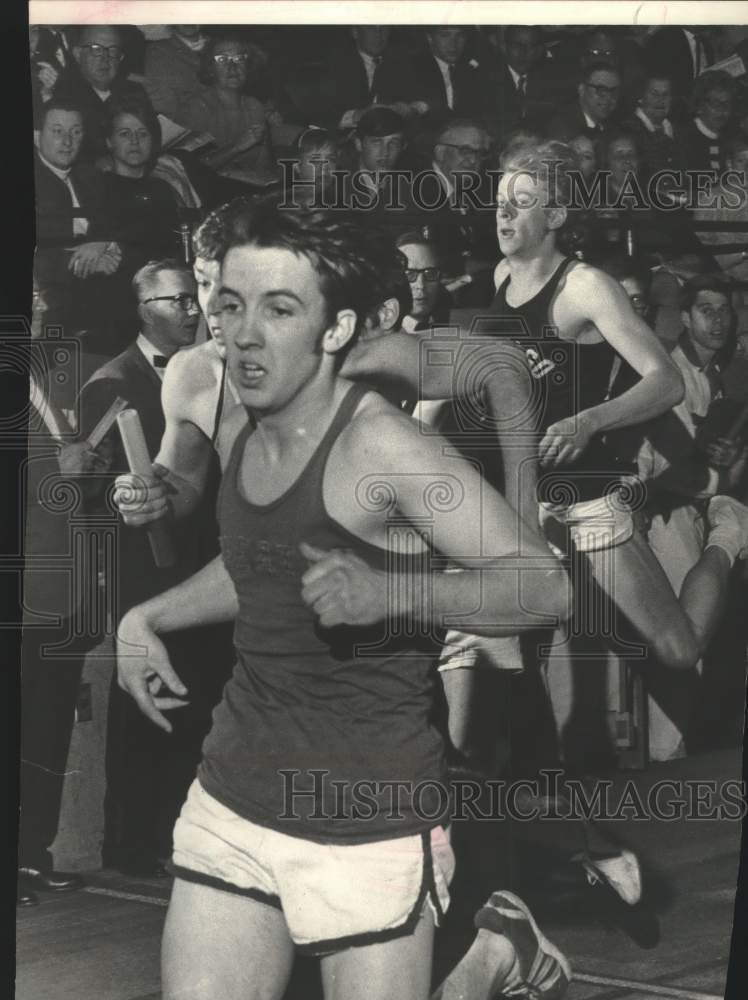 1969 Press Photo Milwaukee Journal Track Meet relay runners bunched on a turn- Historic Images